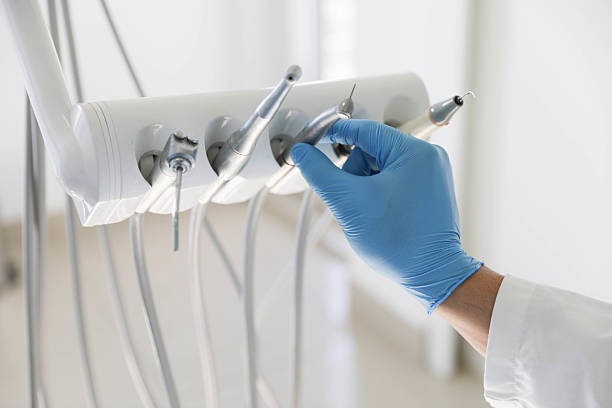 Professional Tooth Extraction technician working in Laguna Hills, CA